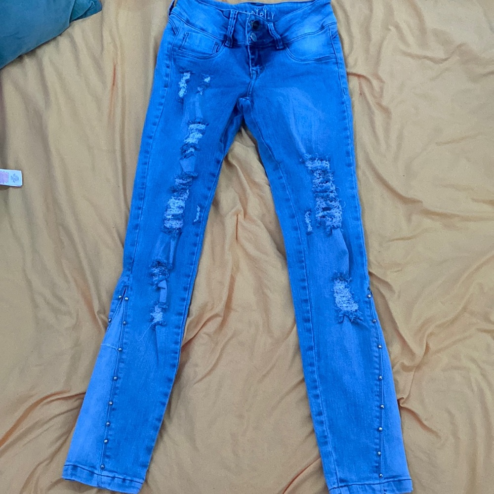 blue washed ripped jeans/ bedazzled on sides